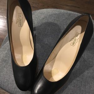 Black Size 11 medium red bottom Heel shoes 100% leather Upper.